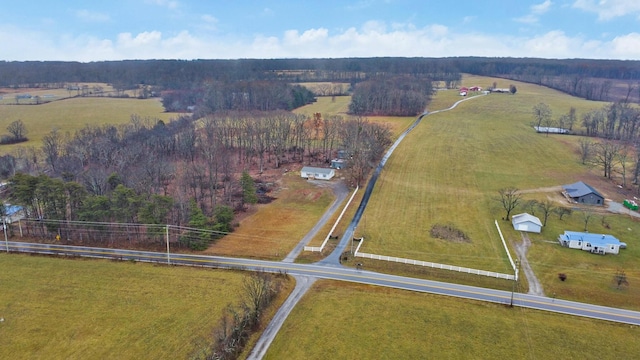 birds eye view of property featuring a rural view