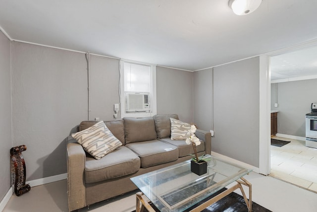 living room with baseboards and cooling unit