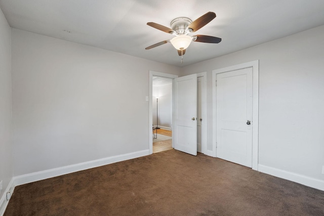 unfurnished bedroom featuring baseboards, ceiling fan, and light colored carpet