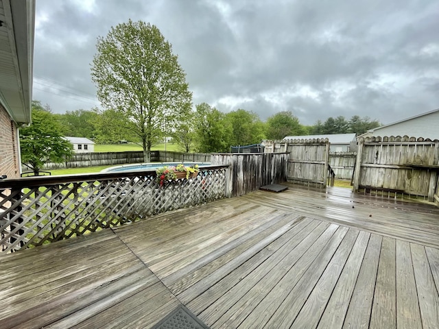 1669 Cornersville Hwy, Lewisburg, TN 37091 - wooden deck featuring a fenced in pool and a fenced backyard
