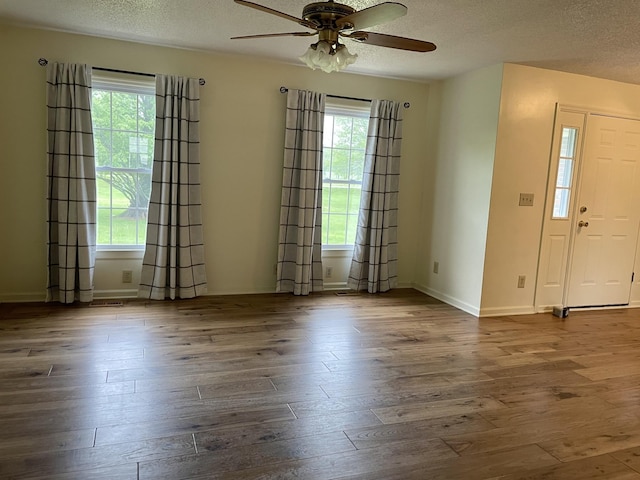1669 Cornersville Hwy, Lewisburg, TN 37091 - empty room with baseboards, a textured ceiling, ceiling fan, and wood finished floors