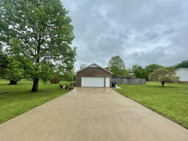 1669 Cornersville Hwy, Lewisburg, TN 37091 - view of front of house featuring fence, brick siding, a front lawn, and a garage