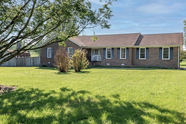 1669 Cornersville Hwy, Lewisburg, TN 37091 - single story home with brick siding, a shingled roof, a front lawn, and fence