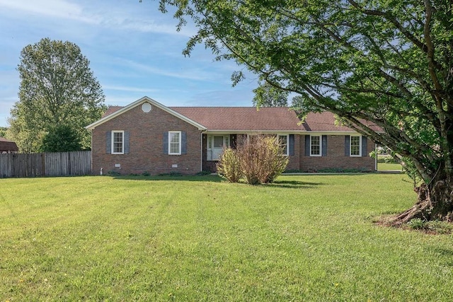 1669 Cornersville Hwy, Lewisburg, TN 37091 - single story home featuring brick siding, a front lawn, fence, and crawl space