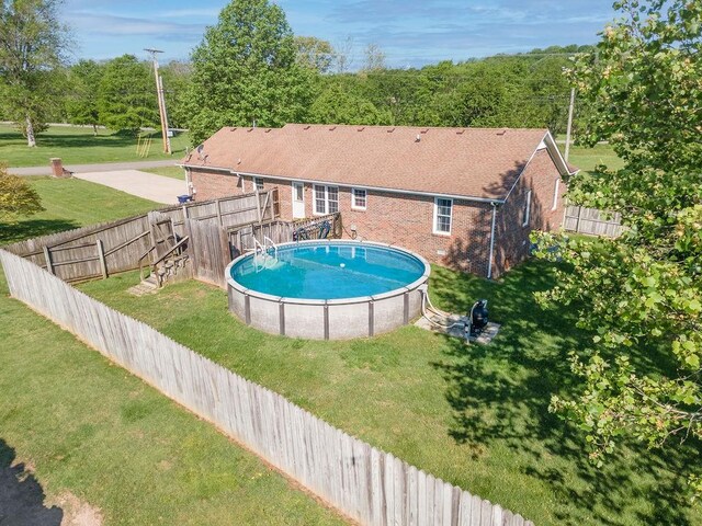 1669 Cornersville Hwy, Lewisburg, TN 37091 - view of pool with a fenced in pool, a yard, and a fenced backyard