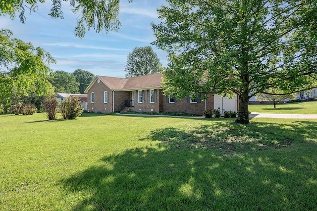 1669 Cornersville Hwy, Lewisburg, TN 37091 - ranch-style home featuring brick siding, an attached garage, and a front yard