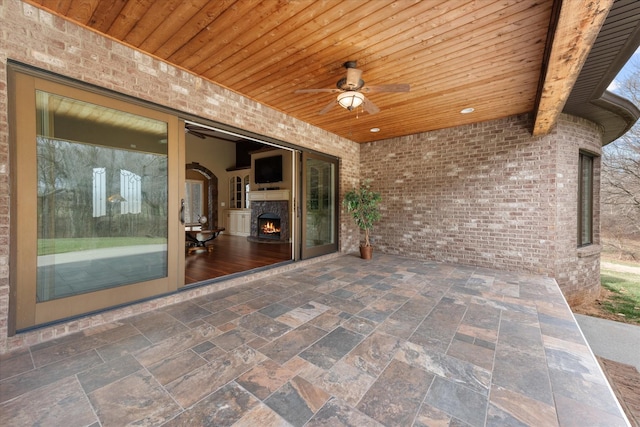 view of patio / terrace featuring ceiling fan