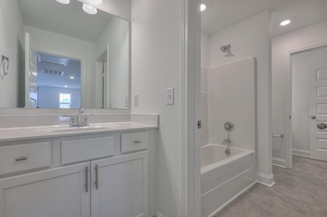 full bath featuring recessed lighting, vanity, visible vents, baseboards, and  shower combination