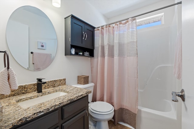 full bathroom featuring shower / bathtub combination with curtain, tile patterned flooring, vanity, and toilet