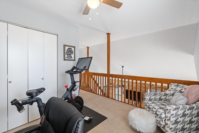 exercise room featuring a ceiling fan and carpet flooring