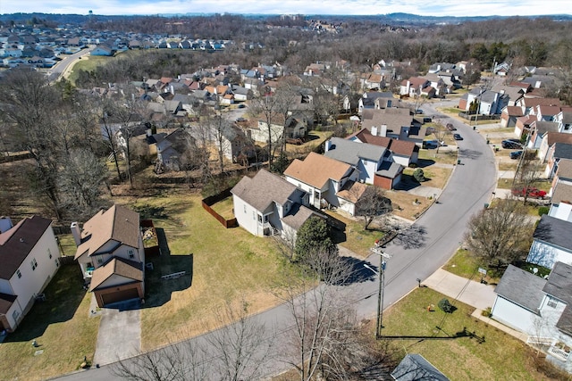 birds eye view of property with a residential view