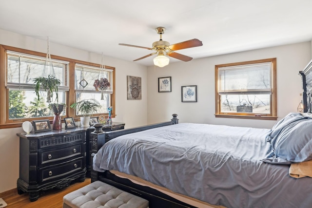 bedroom featuring ceiling fan and wood finished floors