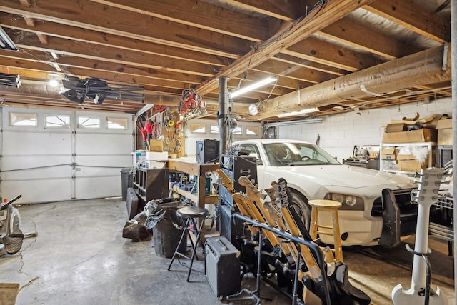 garage featuring concrete block wall