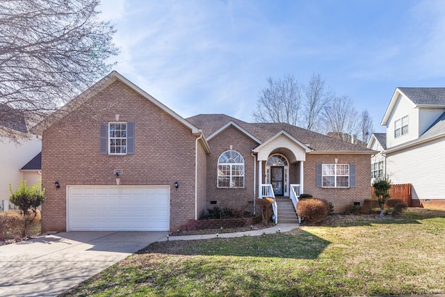 view of front of property featuring an attached garage, brick siding, driveway, crawl space, and a front lawn