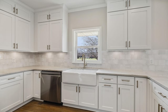 kitchen featuring ornamental molding, dark wood-type flooring, white cabinets, a sink, and dishwasher