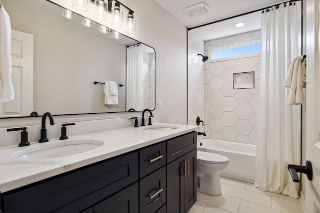 bathroom with shower / bath combo with shower curtain, a sink, toilet, and double vanity