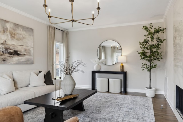 living room featuring ornamental molding, wood finished floors, a high end fireplace, and baseboards