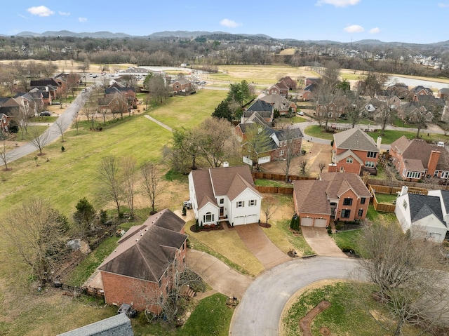 birds eye view of property with a residential view