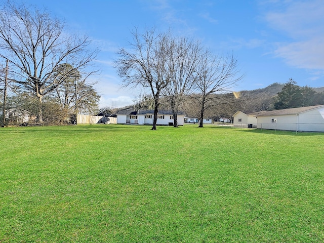 view of yard with fence