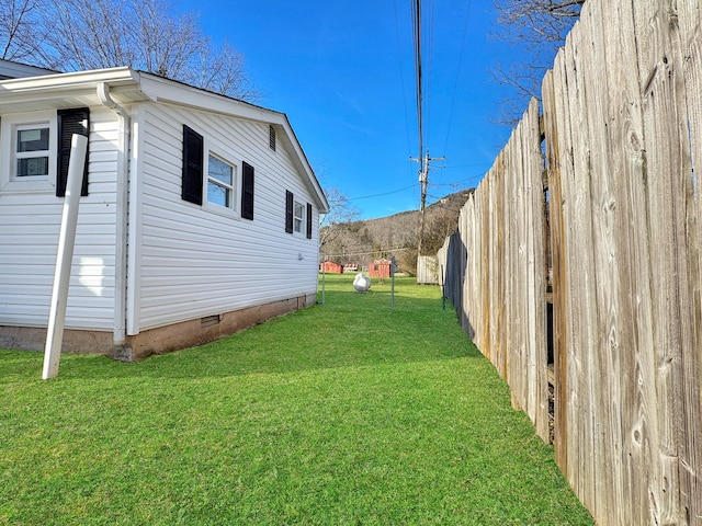 view of yard with fence