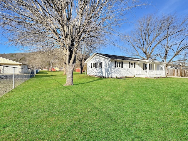 view of yard featuring fence