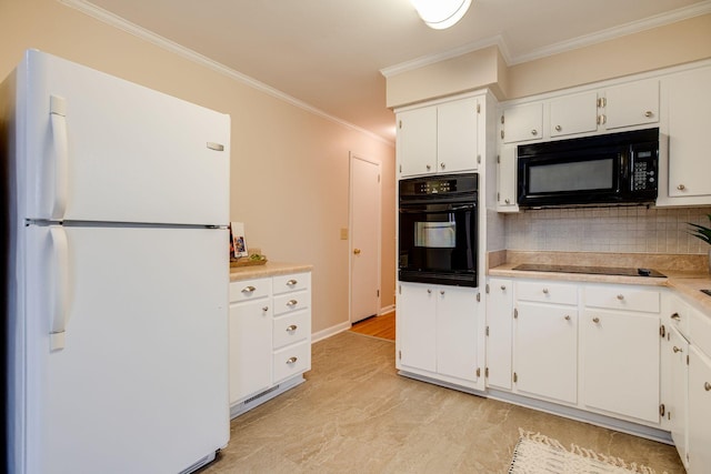 kitchen featuring crown molding, light countertops, backsplash, white cabinets, and black appliances