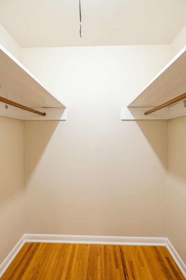 walk in closet featuring light wood-type flooring