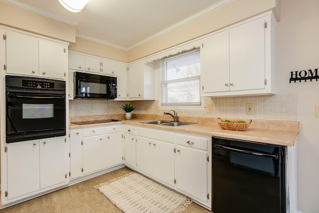 kitchen featuring decorative backsplash, ornamental molding, light countertops, black appliances, and a sink