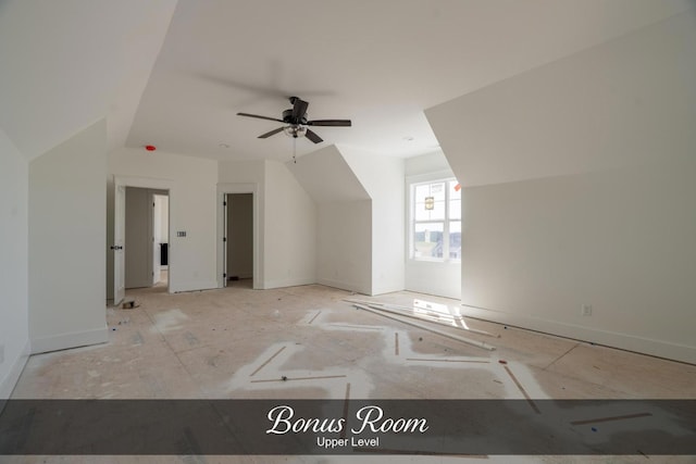 additional living space featuring a ceiling fan