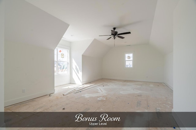 bonus room with vaulted ceiling and ceiling fan