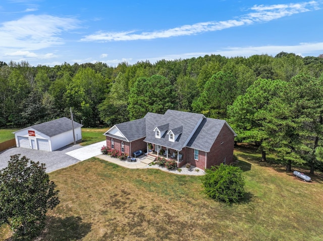 bird's eye view featuring a forest view