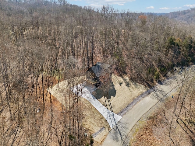 drone / aerial view with a view of trees