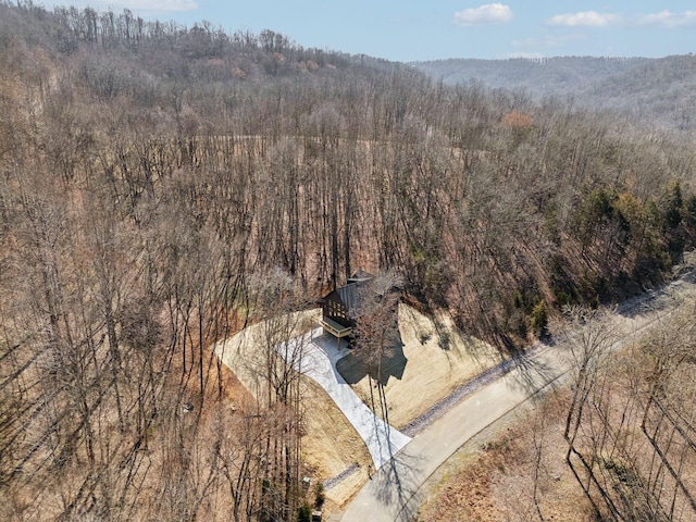 drone / aerial view with a view of trees