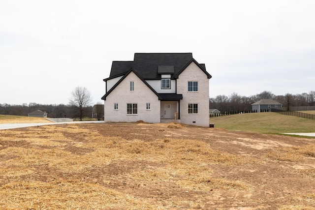 view of front of home with a front lawn