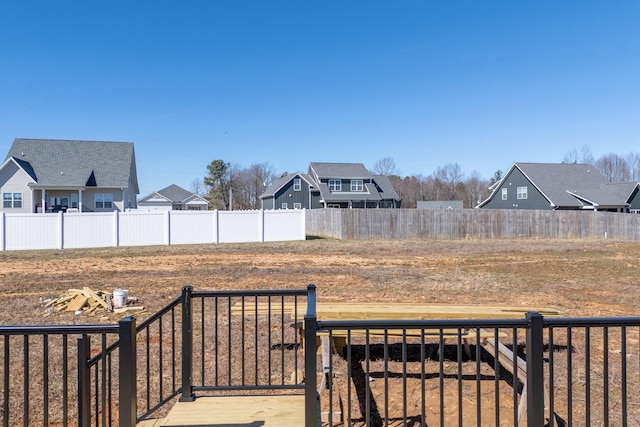 exterior space featuring a fenced backyard