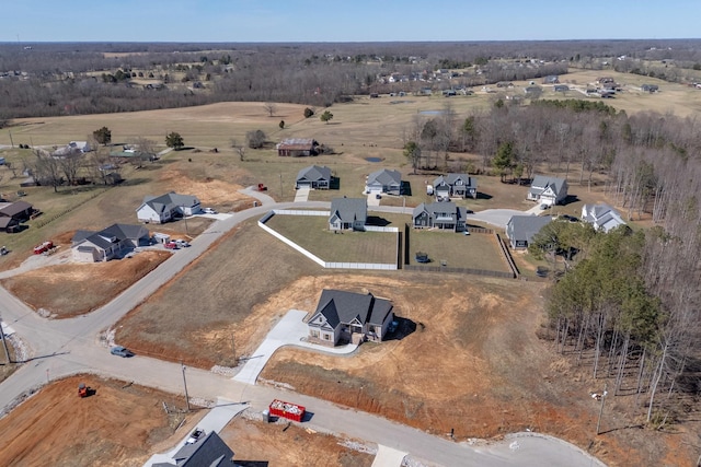 birds eye view of property featuring a rural view