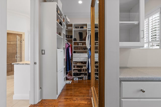 spacious closet with wood finished floors