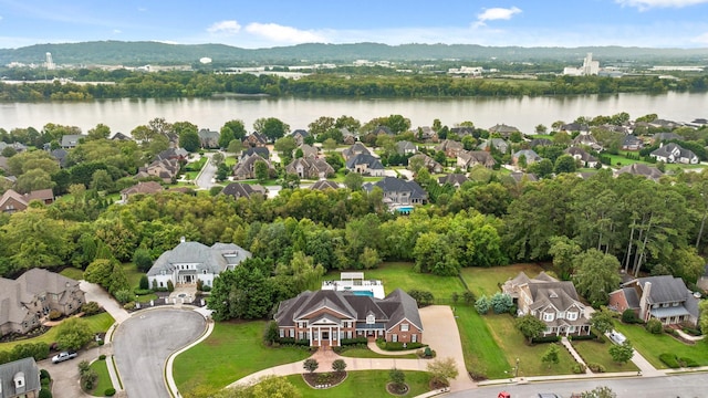 aerial view featuring a residential view and a water view