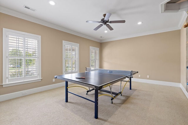 playroom featuring ornamental molding, carpet, and baseboards