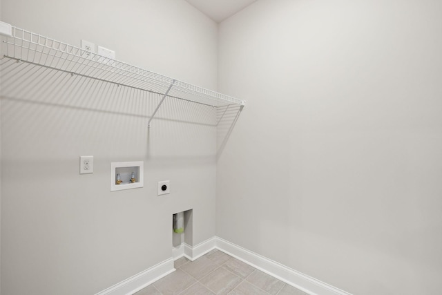 washroom with laundry area, washer hookup, electric dryer hookup, and baseboards