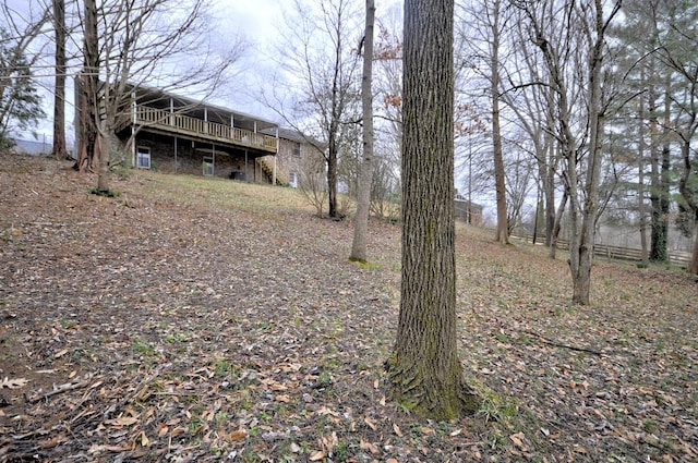 view of yard with a deck