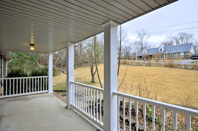 balcony featuring covered porch