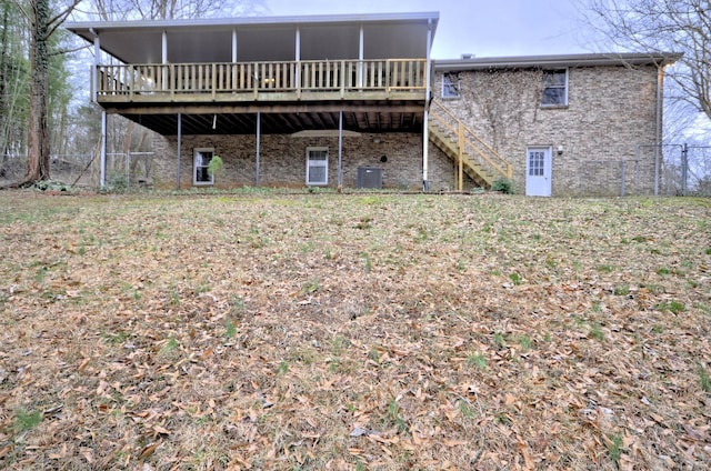 back of house featuring stairway, cooling unit, fence, and a deck