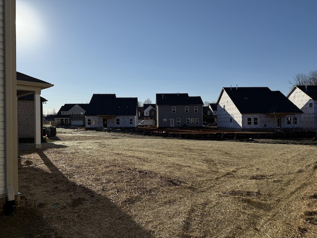 view of yard with a residential view