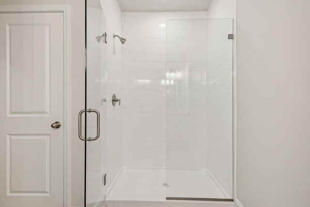 bathroom featuring a shower stall