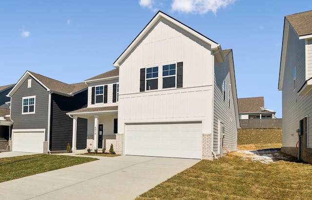 view of front of house with a garage, brick siding, and driveway