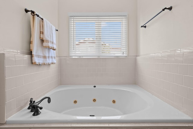 bathroom featuring a whirlpool tub