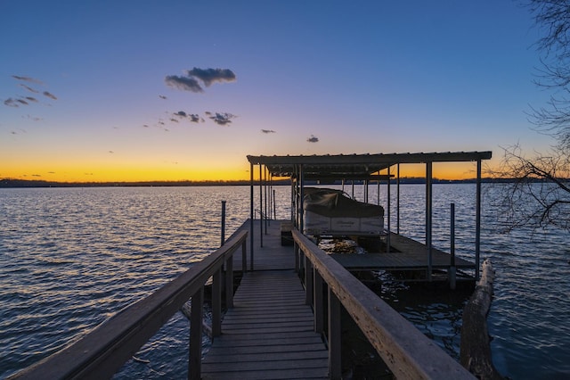 view of dock with a water view and boat lift