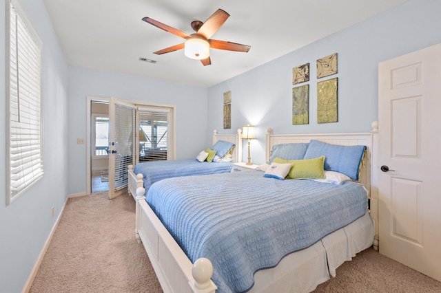 bedroom with a ceiling fan, baseboards, visible vents, and carpet flooring