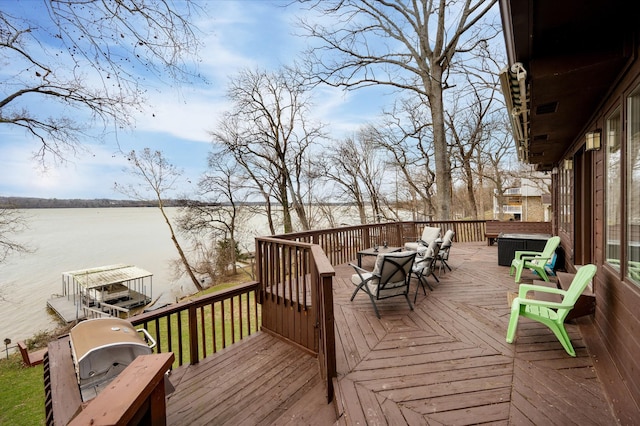 wooden terrace with a water view